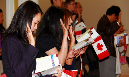 At ceremony 60 immigrants take pledge of Canada citizenship
